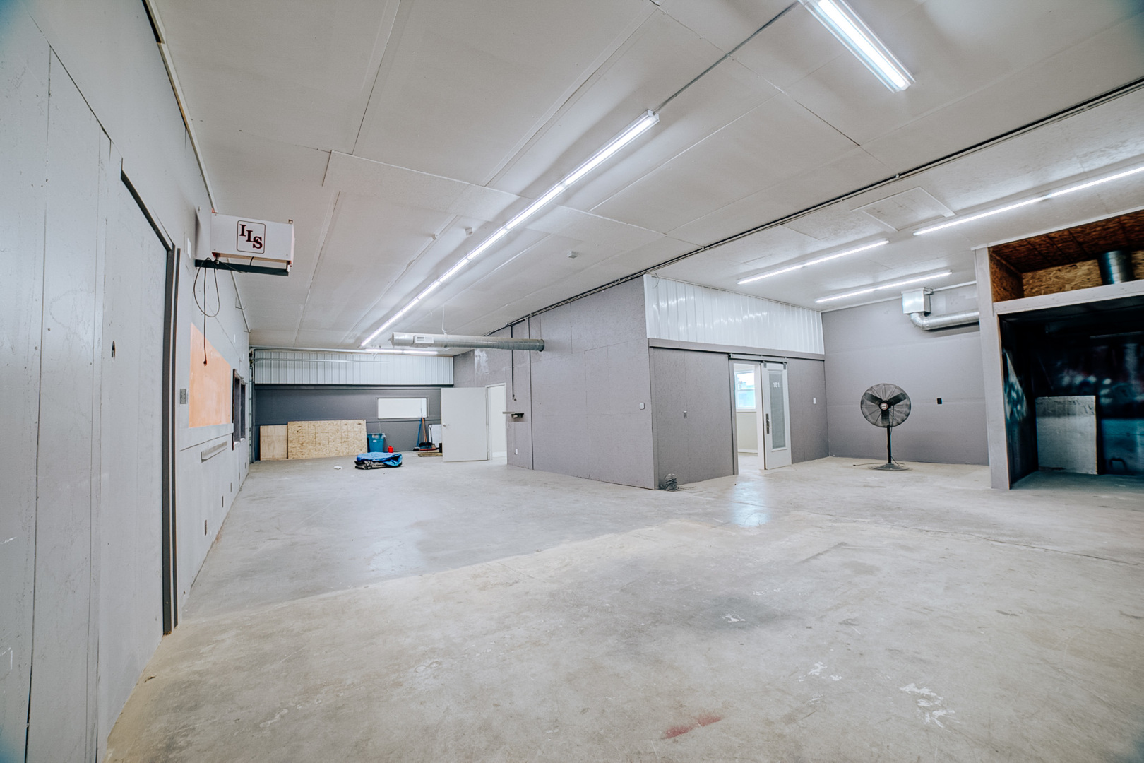 304 West Walnut Street Watseka, IL 60970 - Photo 15 of 28 a view of empty room with fireplace and stairs