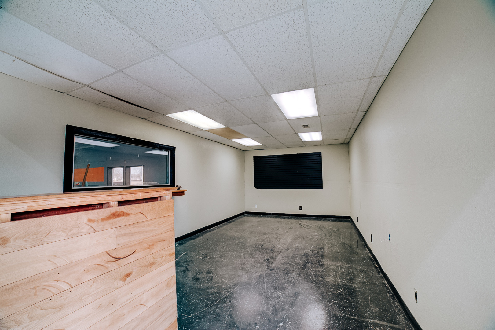 304 West Walnut Street Watseka, IL 60970 - Photo 22 of 28 a view of an empty room with wooden floor and a window