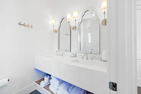 a view of a livingroom with furniture and a flat screen tv