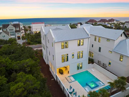 a view of kitchen and dining room with wooden floor