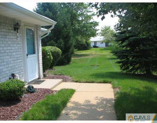 625 B Deal Road Monroe Township, NJ 08831 - Photo 10 of 10 a view of a house with a yard
