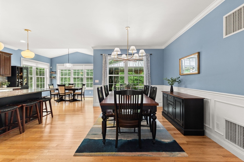 6 Jacoby Way Seekonk, MA 02771 - Photo 13 of 42 a view of a dining room with furniture window and wooden floor
