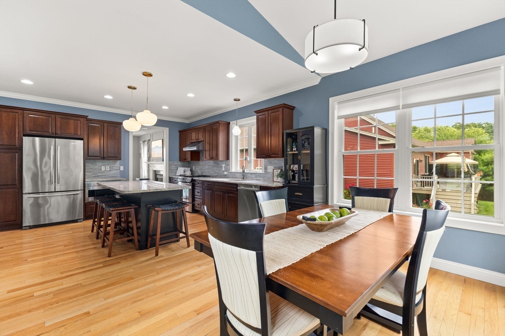 6 Jacoby Way Seekonk, MA 02771 - Photo 14 of 42 a living room with stainless steel appliances kitchen island granite countertop furniture wooden floor and a kitchen view
