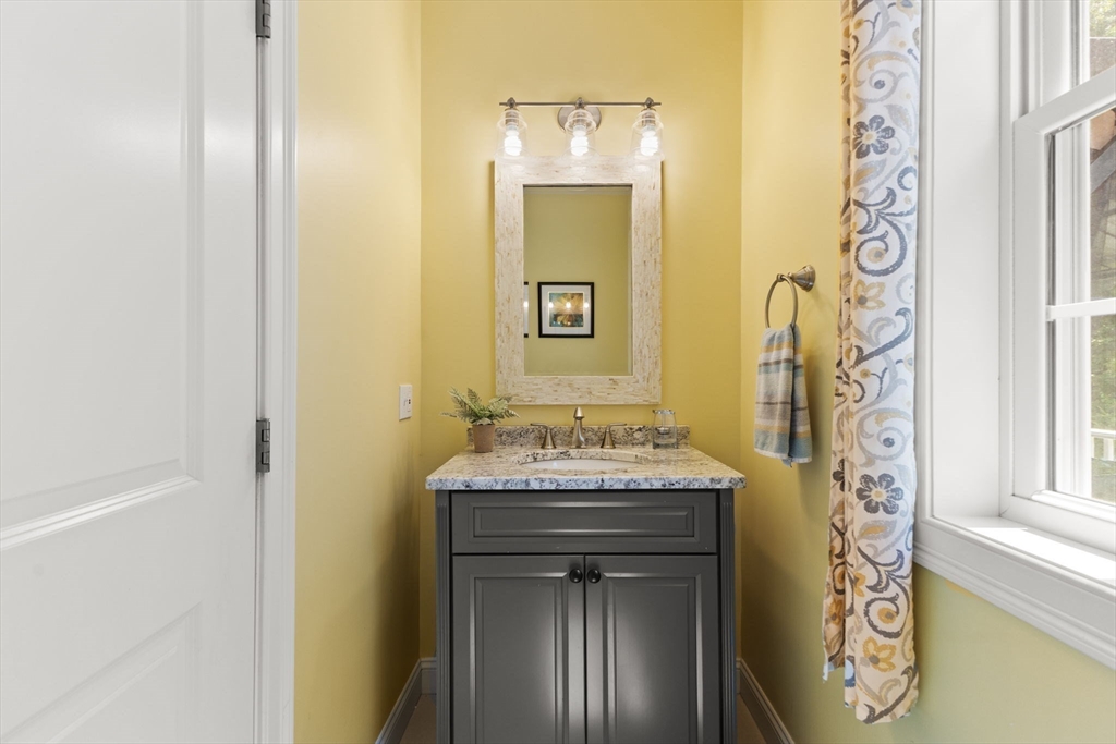 6 Jacoby Way Seekonk, MA 02771 - Photo 15 of 42 a bathroom with a granite countertop sink a mirror and a shower