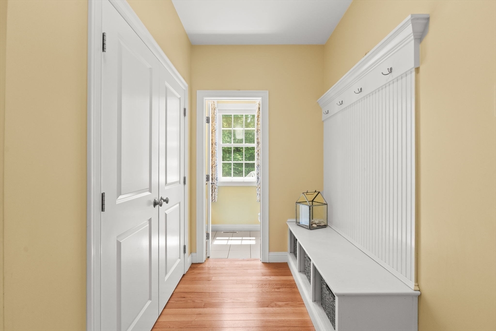 6 Jacoby Way Seekonk, MA 02771 - Photo 16 of 42 a hallway with wooden floor and staircase