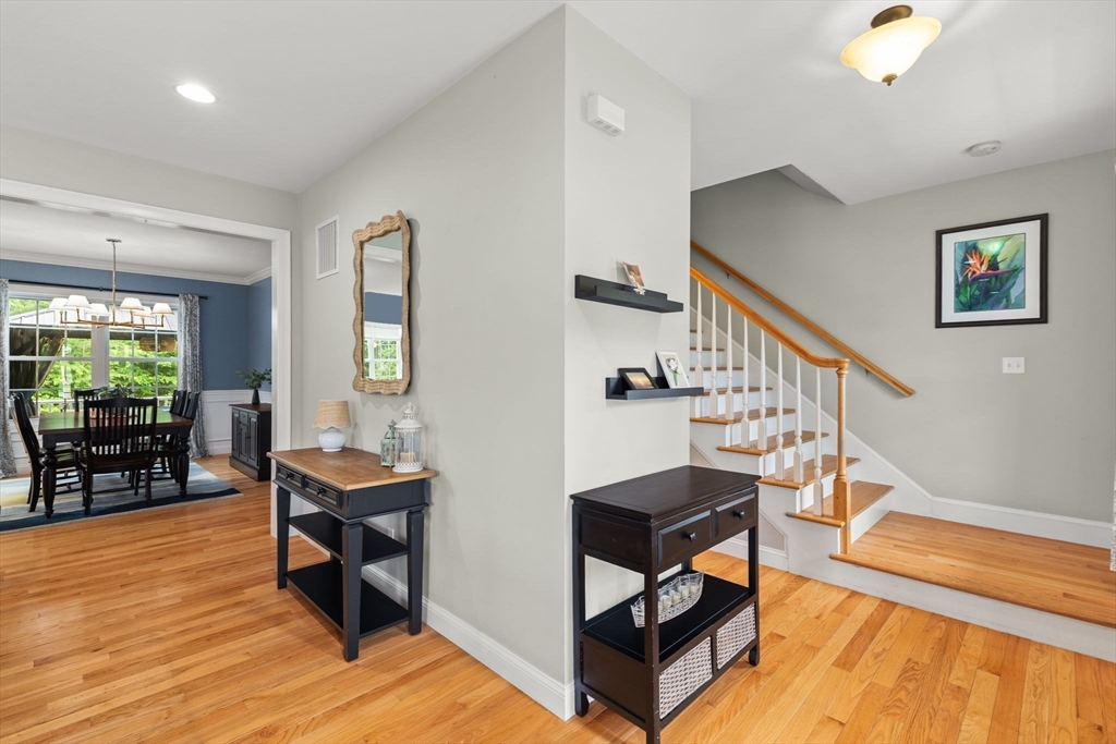 6 Jacoby Way Seekonk, MA 02771 - Photo 17 of 42 a living room with furniture a rug potted plant and wooden floor