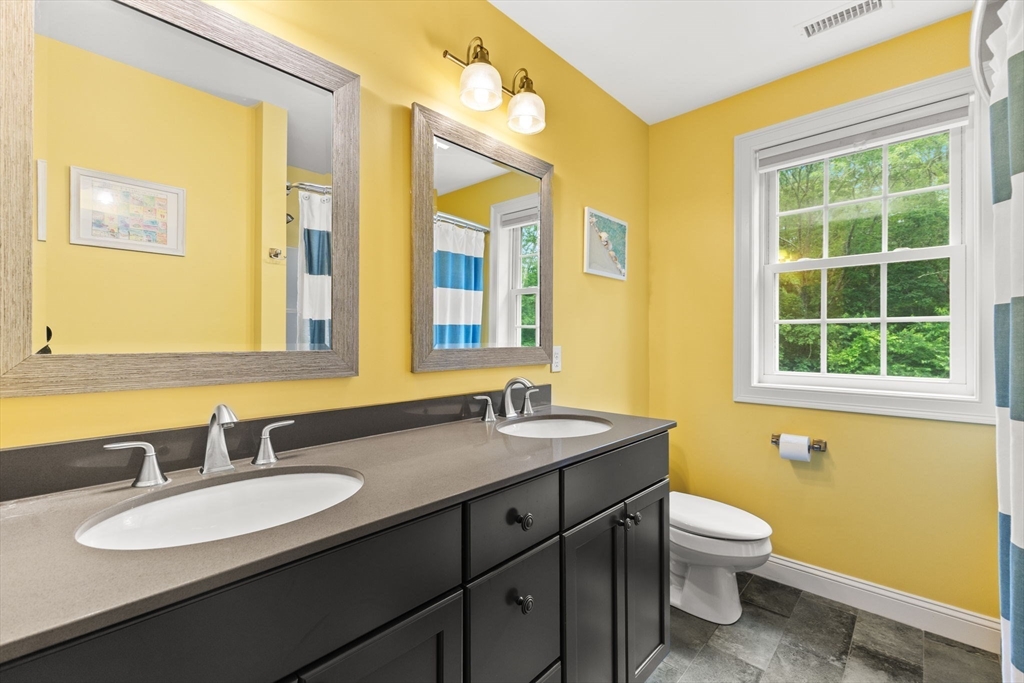 6 Jacoby Way Seekonk, MA 02771 - Photo 25 of 42 a bathroom with a granite countertop sink and a mirror