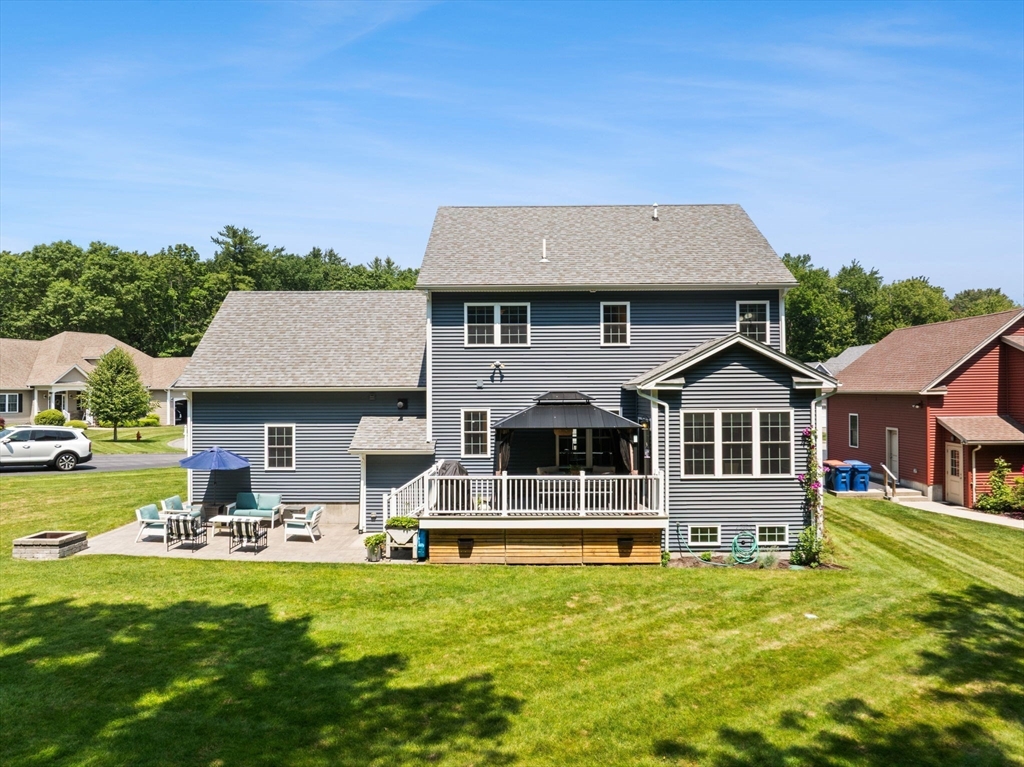 6 Jacoby Way Seekonk, MA 02771 - Photo 3 of 42 a front view of a house with a garden