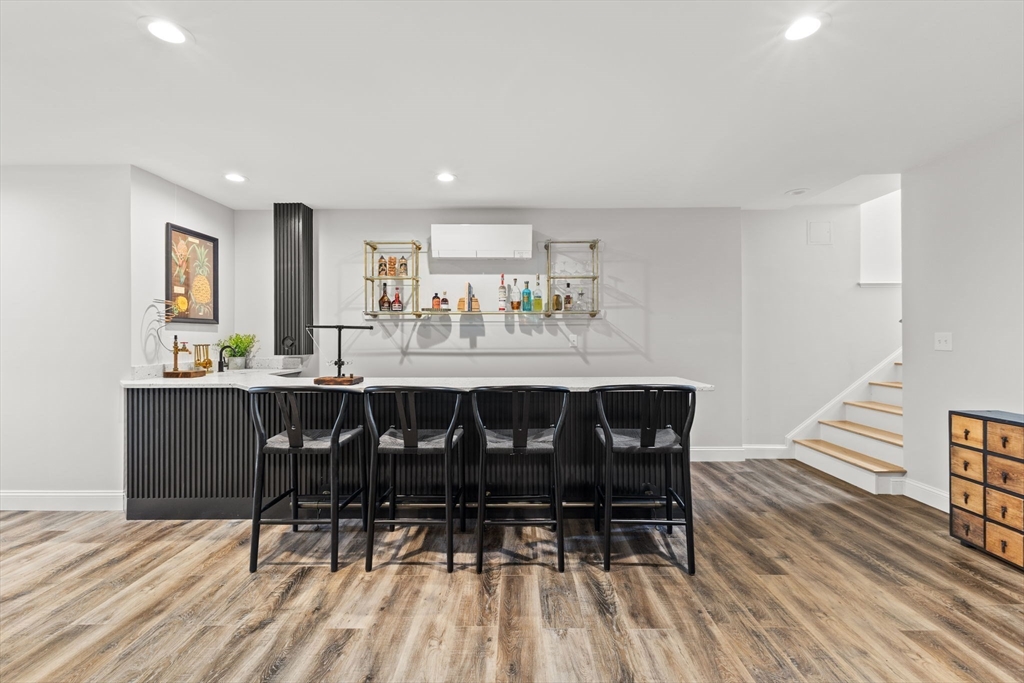 6 Jacoby Way Seekonk, MA 02771 - Photo 33 of 42 a view of a dining room with furniture and wooden floor
