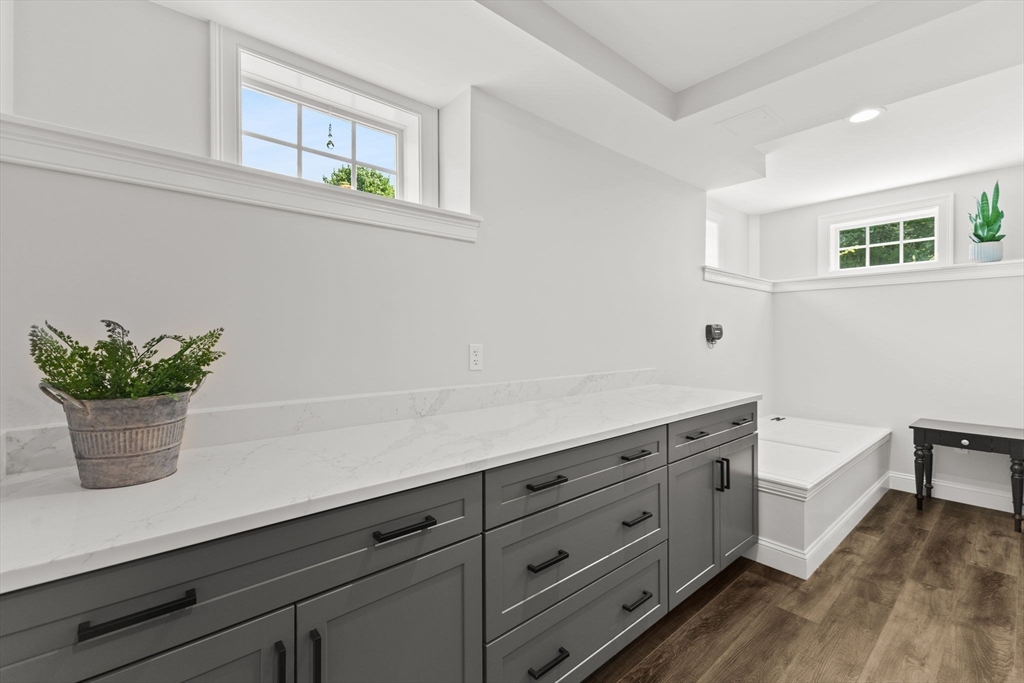 6 Jacoby Way Seekonk, MA 02771 - Photo 35 of 42 a room with wooden floor and potted plant