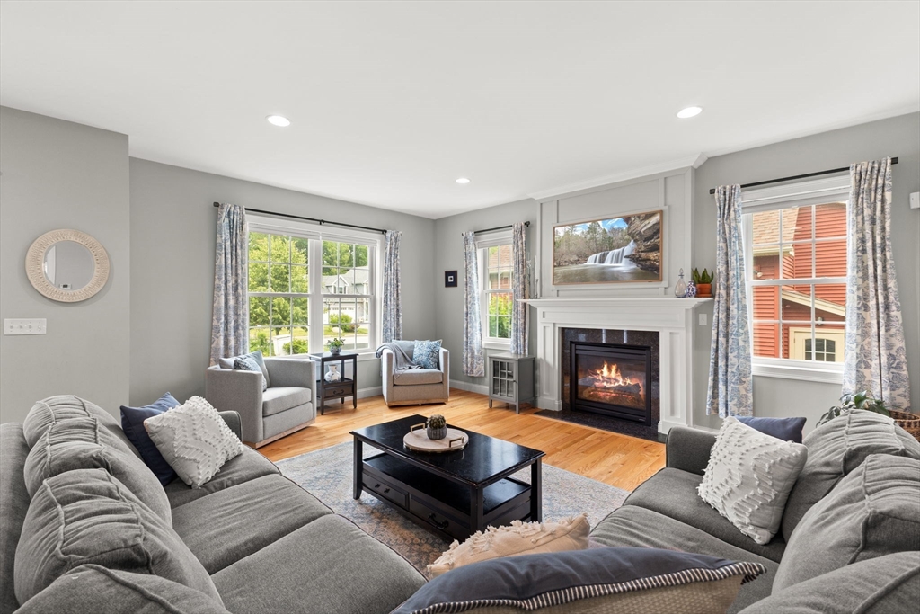 6 Jacoby Way Seekonk, MA 02771 - Photo 9 of 42 a living room with furniture window and a fireplace