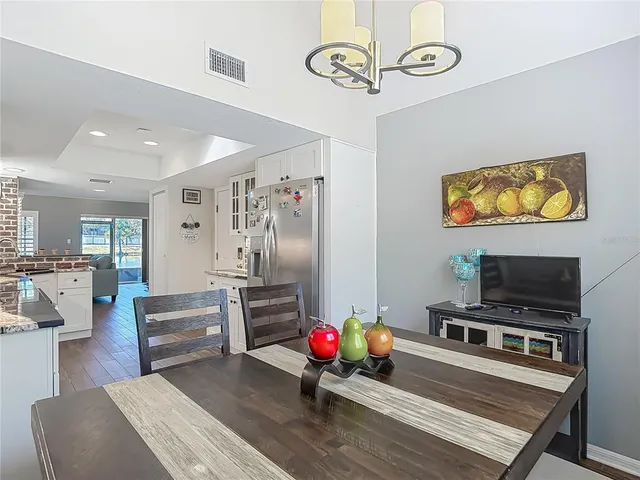a bathroom with a sink toilet a mirror and shower