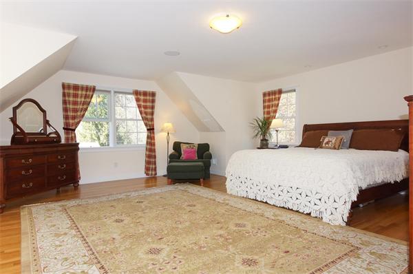 75 Deerfield Road Needham, MA 02492 - Photo 15 of 27 a bedroom with a bed and a dresser