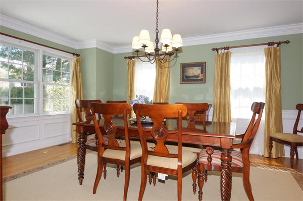75 Deerfield Road Needham, MA 02492 - Photo 3 of 27 a view of a dining room with furniture and a chandelier