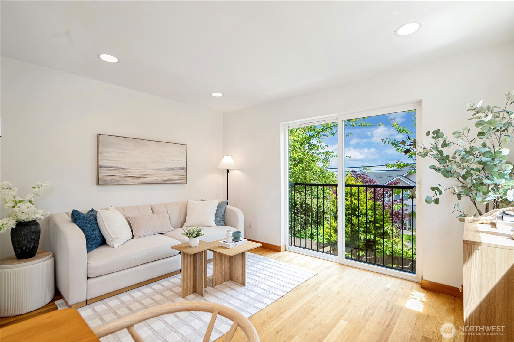 6348 34th Avenue Southwest, Unit C Seattle, WA 98126 - Photo 13 of 24 a living room with furniture and a large window