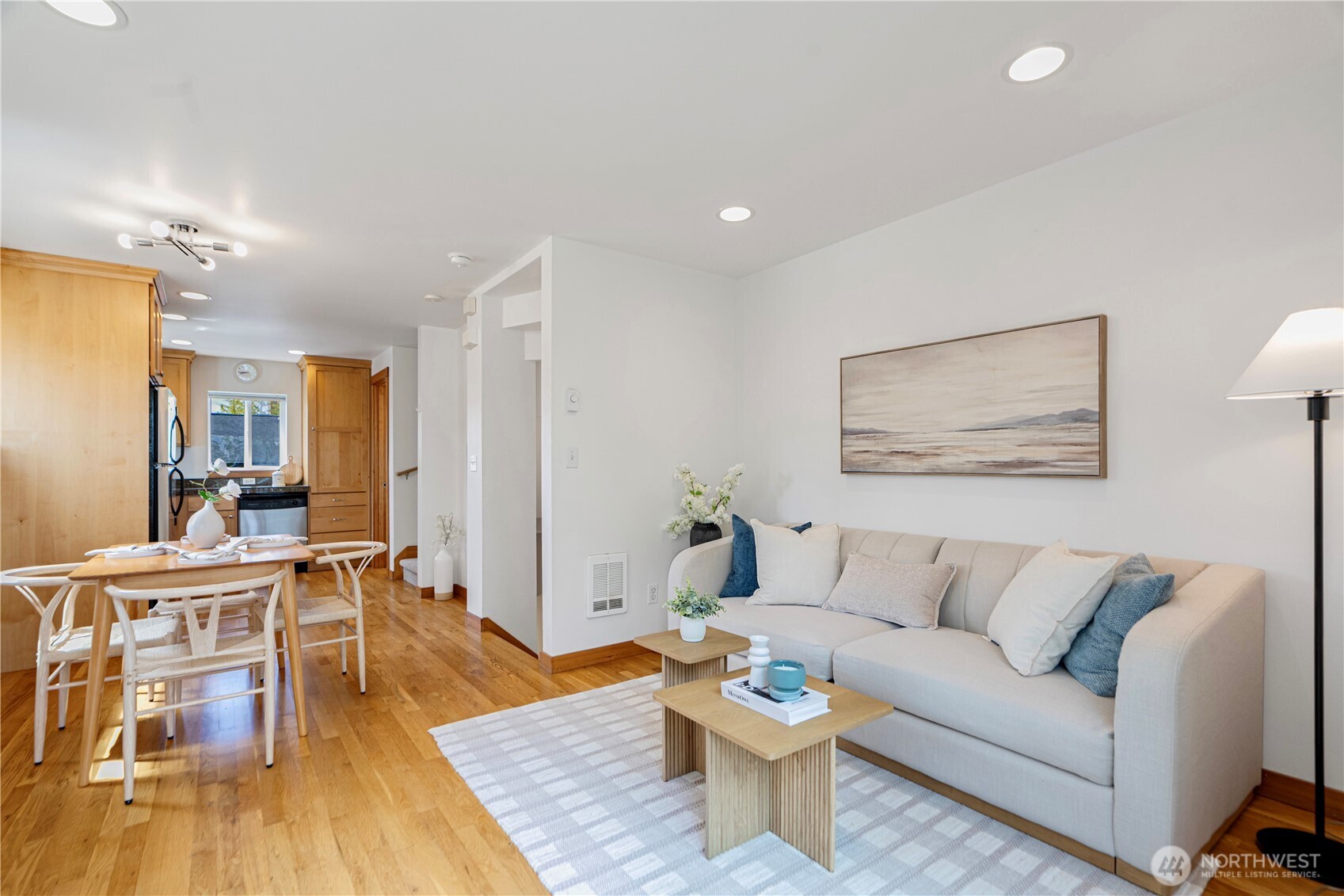 6348 34th Avenue Southwest, Unit C Seattle, WA 98126 - Photo 14 of 24 a living room with furniture and a wooden floor