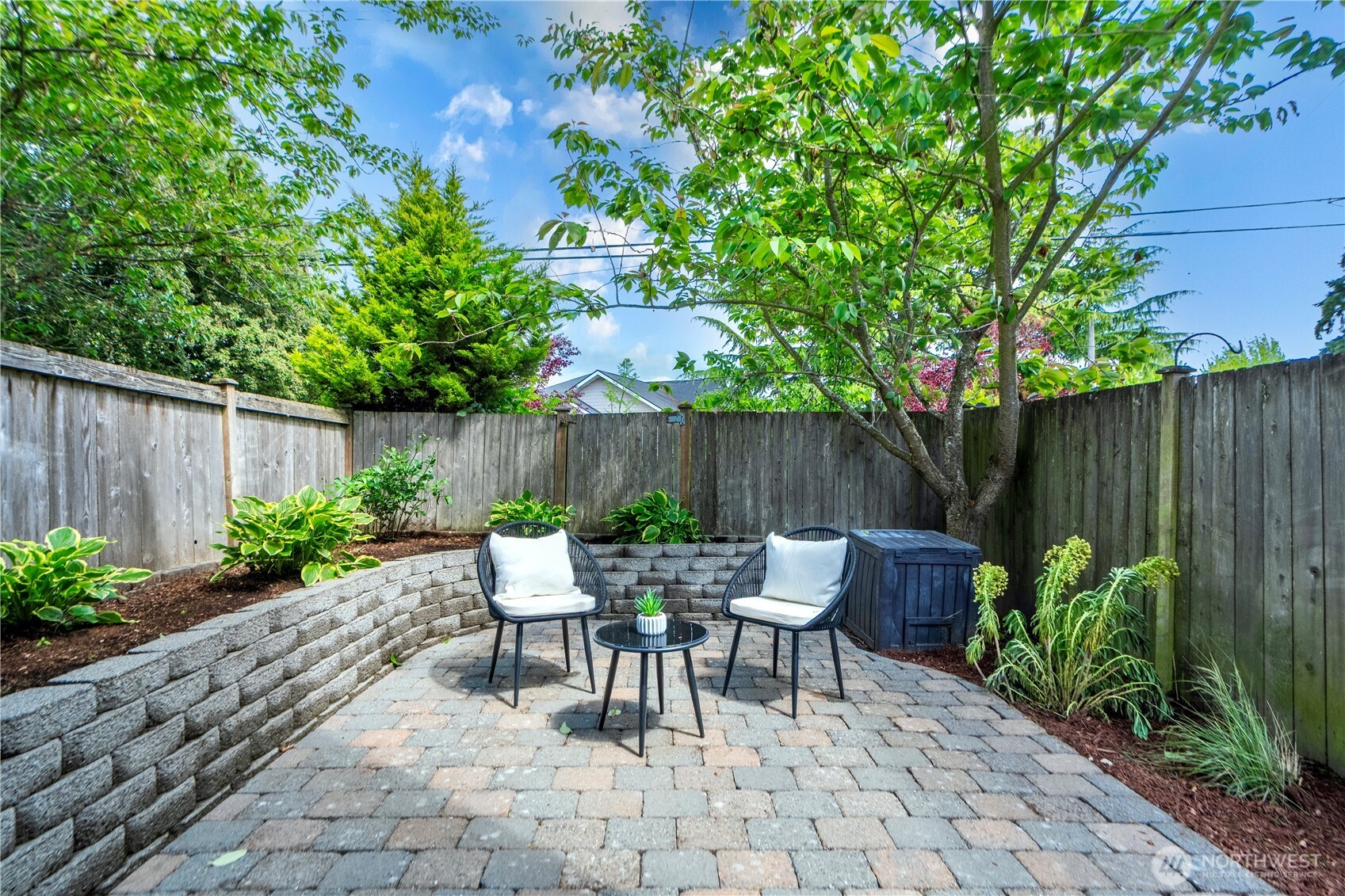 6348 34th Avenue Southwest, Unit C Seattle, WA 98126 - Photo 21 of 24 a view of backyard with seating and green space