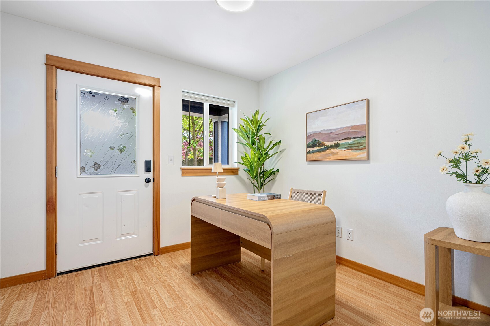 6348 34th Avenue Southwest, Unit C Seattle, WA 98126 - Photo 3 of 24 a room with a bed and a table in it