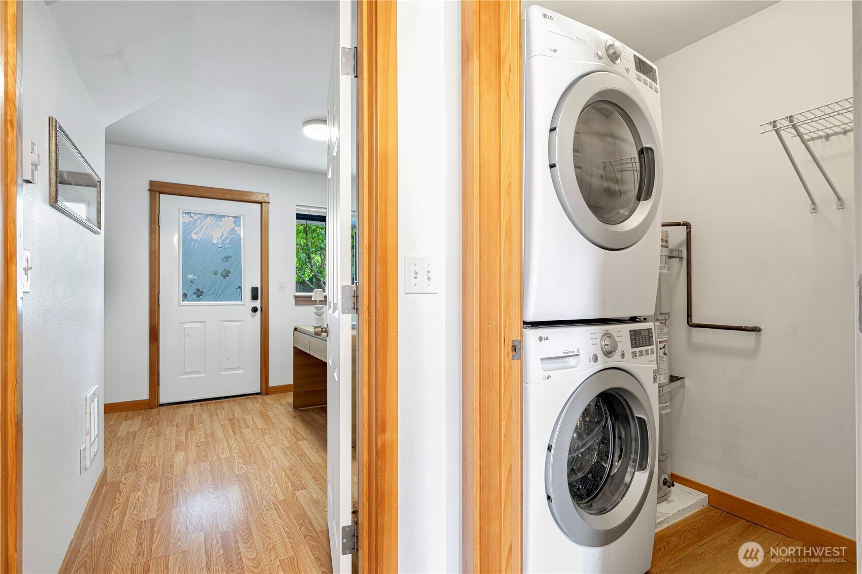 6348 34th Avenue Southwest, Unit C Seattle, WA 98126 - Photo 4 of 24 a view of a hallway with washer and dryer
