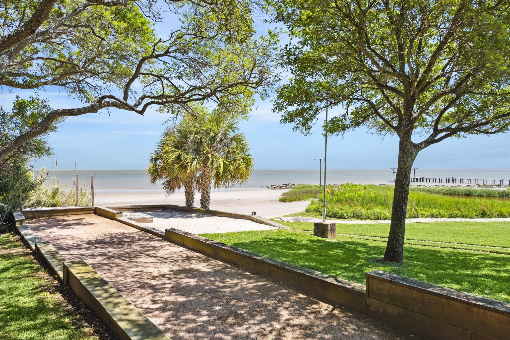 633 Quintana Roo Place Seabrook, TX 77586 - Photo 40 of 47 This property offers so much more than can be shown online. Pictured here is a bocce ball court by the private beach.