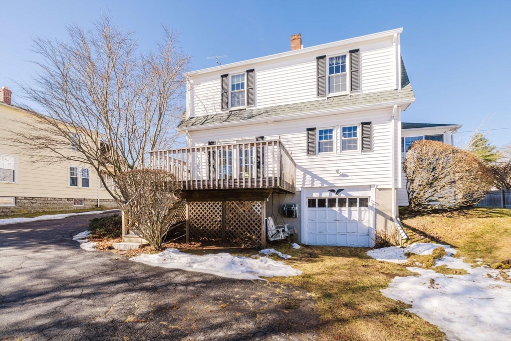 31 South Main Street Bellingham, MA 02019 - Photo 2 of 41 a front view of a house with garage