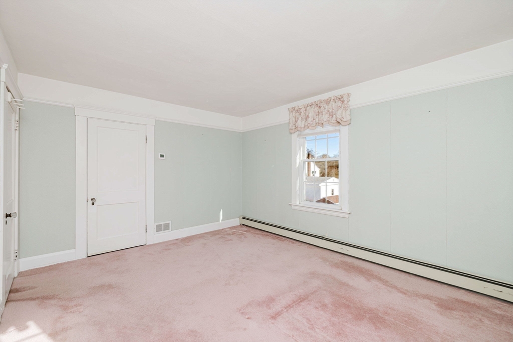 31 South Main Street Bellingham, MA 02019 - Photo 26 of 41 an empty room with windows