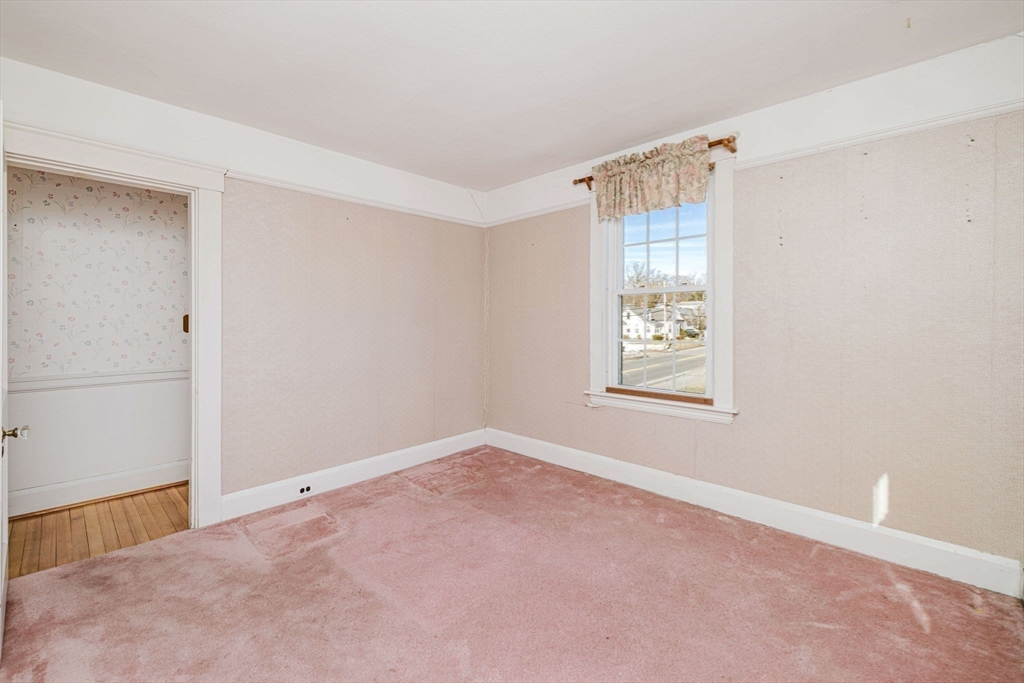 31 South Main Street Bellingham, MA 02019 - Photo 28 of 41 a view of an empty room with a window
