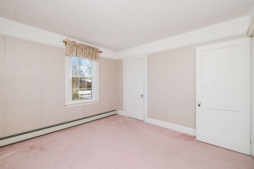31 South Main Street Bellingham, MA 02019 - Photo 29 of 41 a view of an empty room with a window
