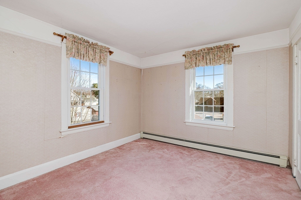 31 South Main Street Bellingham, MA 02019 - Photo 31 of 41 a view of an empty room with a window
