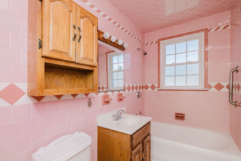 31 South Main Street Bellingham, MA 02019 - Photo 32 of 41 a bathroom with a sink toilet tub and shower
