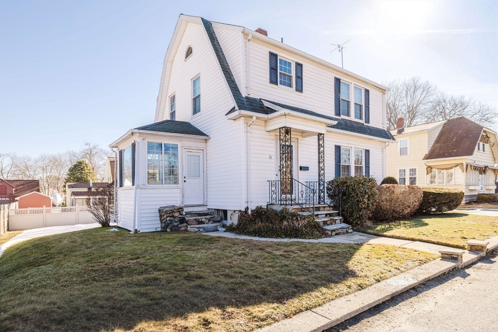 31 South Main Street Bellingham, MA 02019 - Photo 4 of 41 a front view of a house with garden