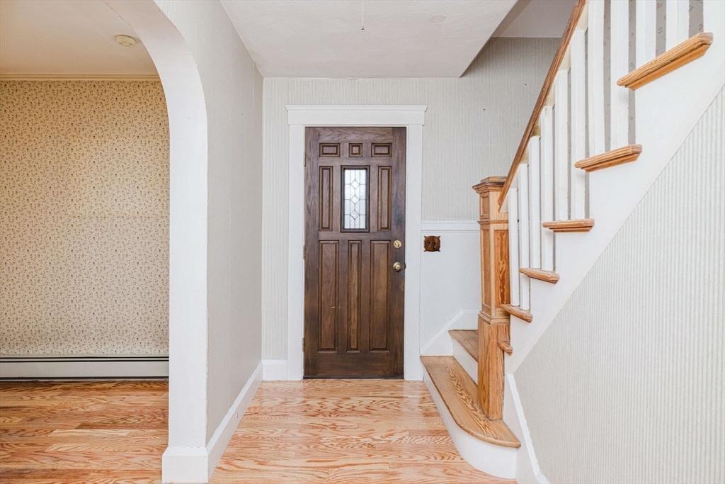 31 South Main Street Bellingham, MA 02019 - Photo 6 of 41 a view of an entryway with staircase