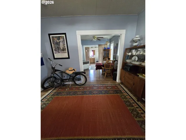 a kitchen with a sink and a stove top oven