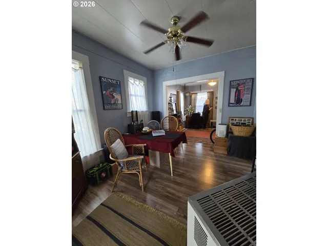 a bed room with a bed and a window