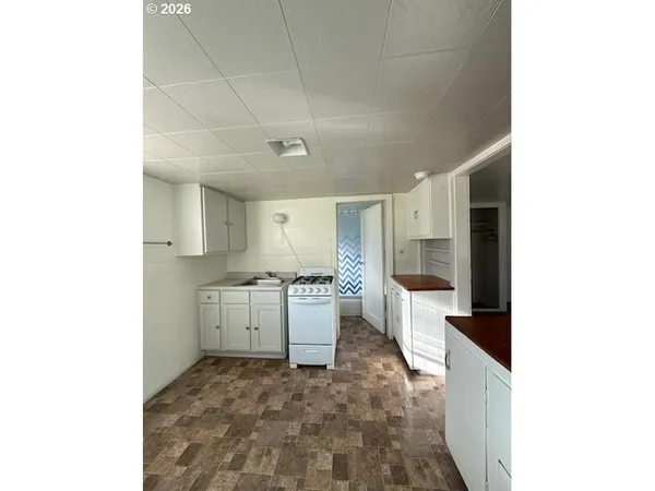 a view of walk in closet with window