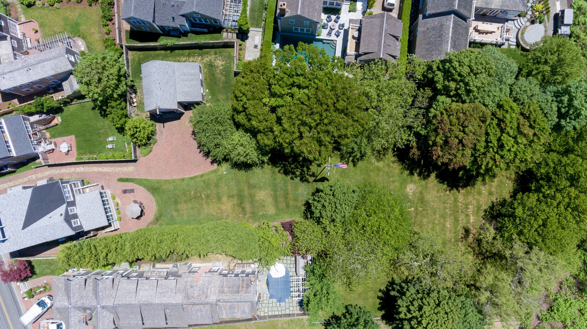 24 Cliff Road Nantucket, MA 02554 - Photo 19 of 44 an aerial view of a house having yard
