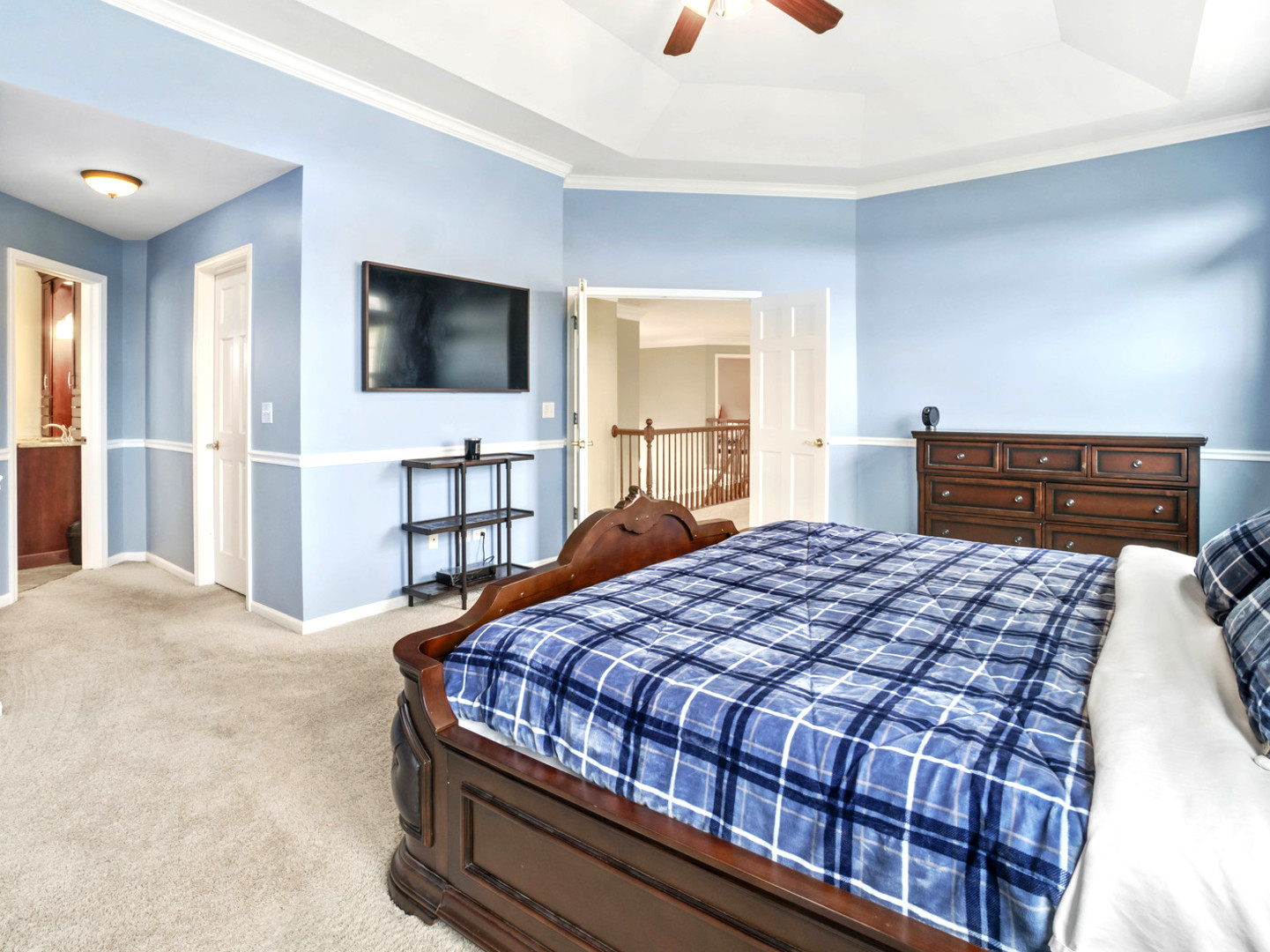 18714 West Lazy Acre Road Lake Villa, IL 60046 - Photo 12 of 36 a bedroom with a bed and a flat screen tv