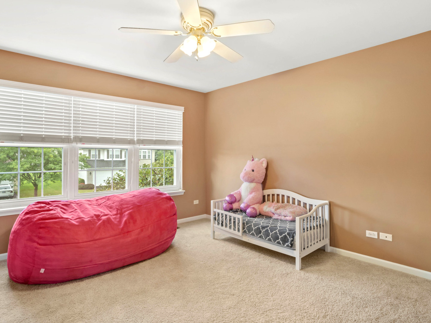 18714 West Lazy Acre Road Lake Villa, IL 60046 - Photo 18 of 36 a bedroom with a bed and a window