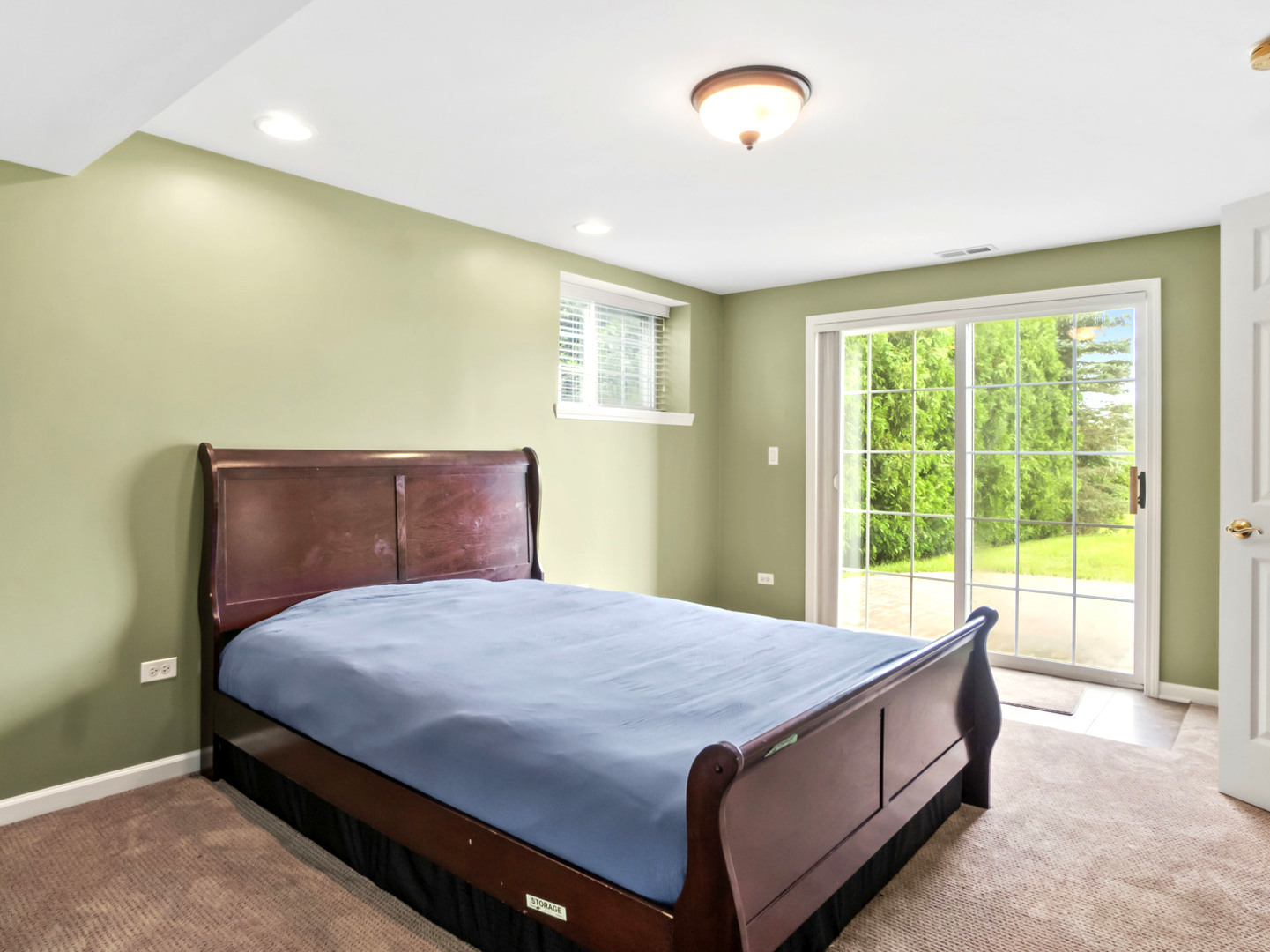 18714 West Lazy Acre Road Lake Villa, IL 60046 - Photo 23 of 36 a bed sitting in a room next to a window