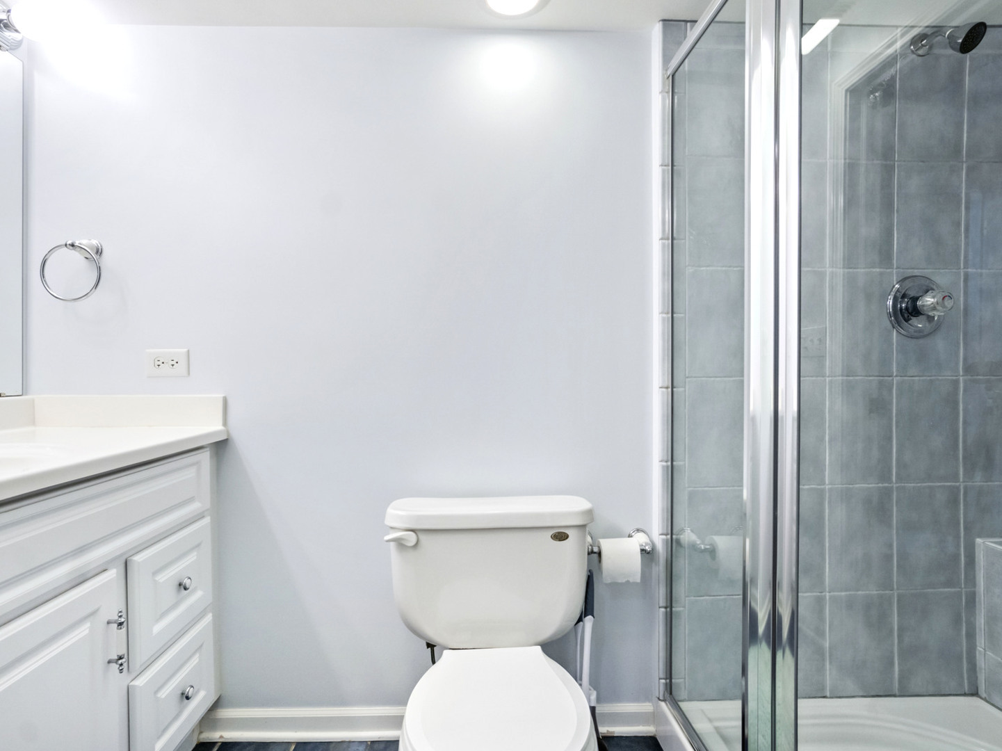 18714 West Lazy Acre Road Lake Villa, IL 60046 - Photo 25 of 36 a bathroom with a toilet sink and shower