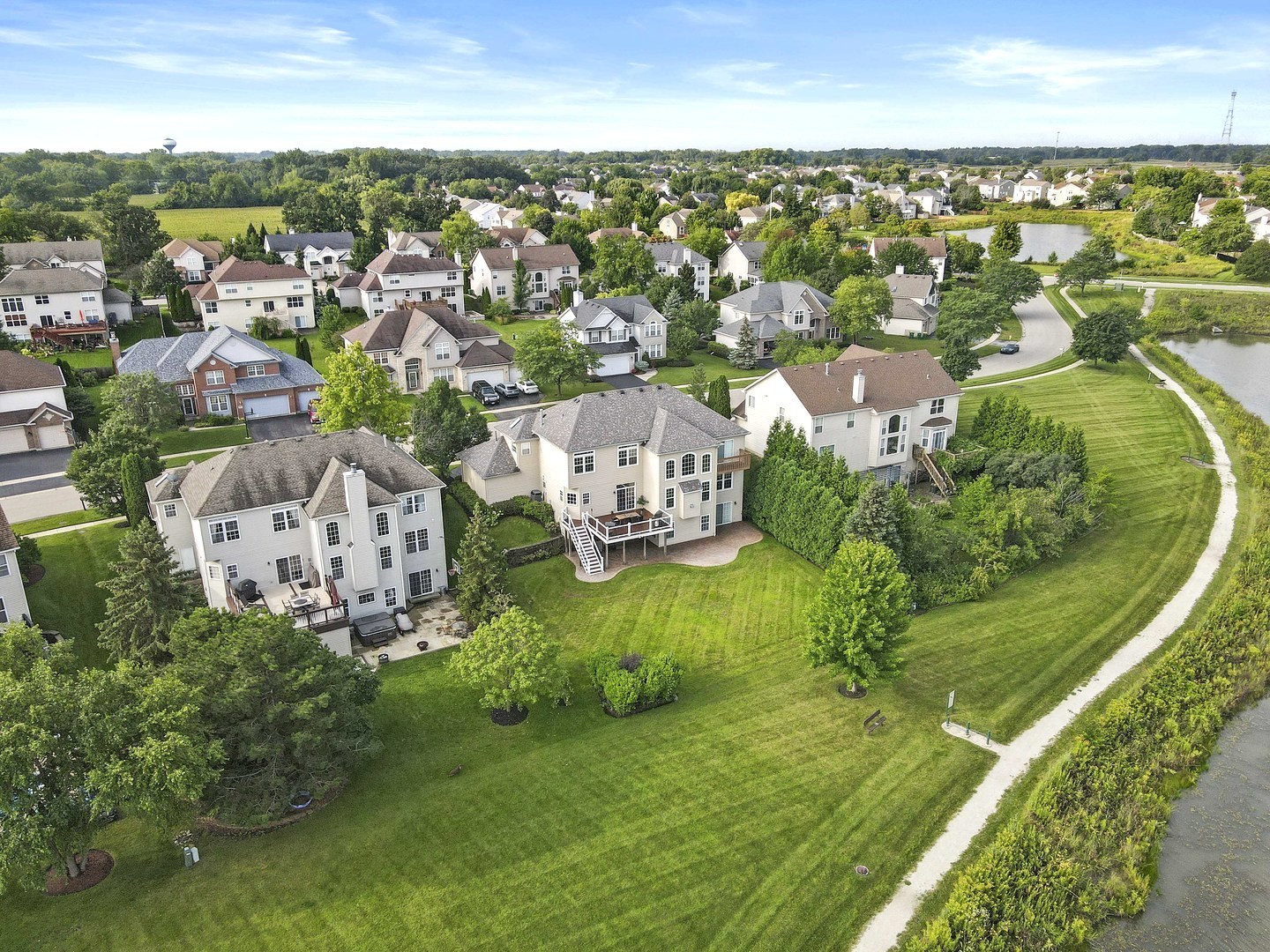 18714 West Lazy Acre Road Lake Villa, IL 60046 - Photo 30 of 36 an aerial view of residential houses with outdoor space and trees