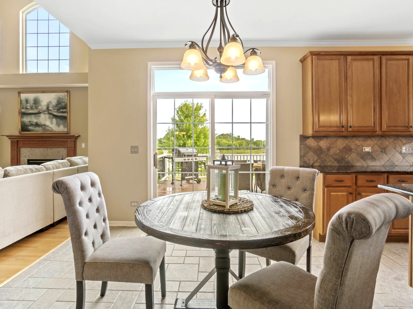 18714 West Lazy Acre Road Lake Villa, IL 60046 - Photo 7 of 36 a view of a dining room with furniture window and outside view