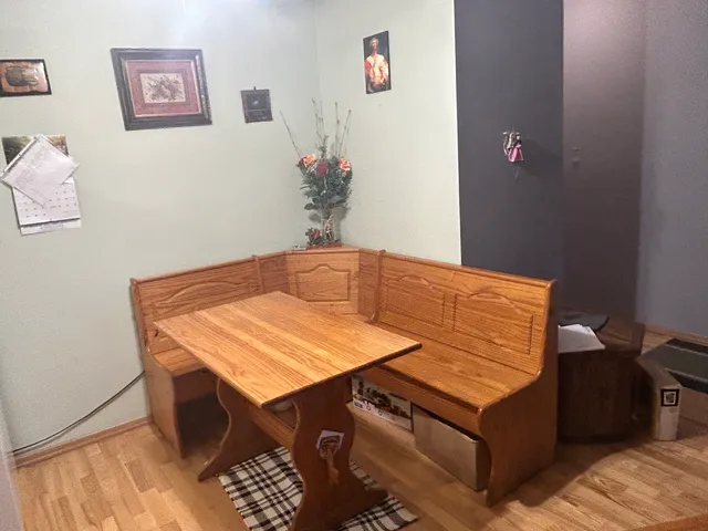 a view of a dining room with furniture