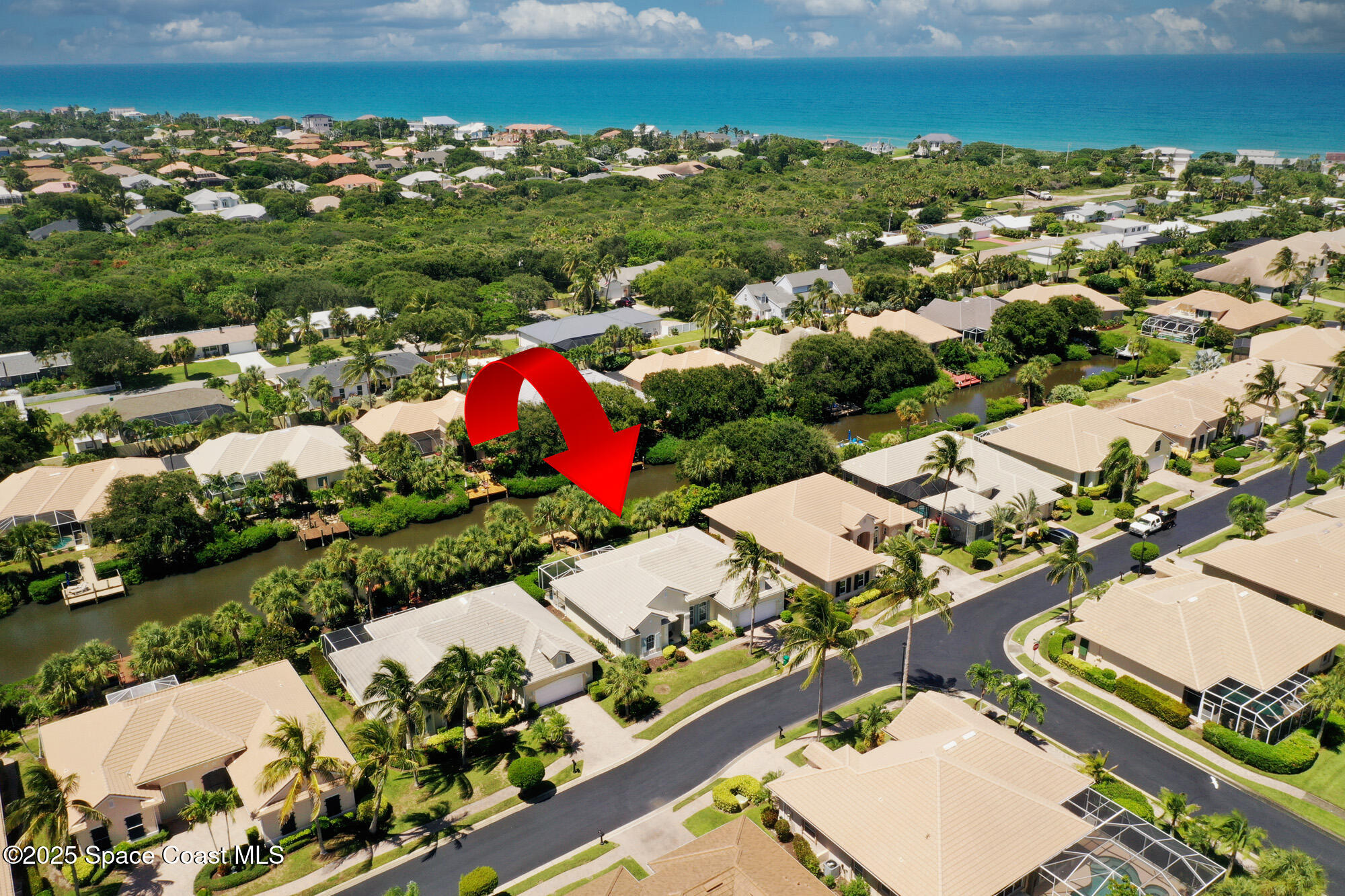 5357 Solway Drive Melbourne Beach, FL 32951 - Photo 17 of 31 an aerial view of residential houses with outdoor space