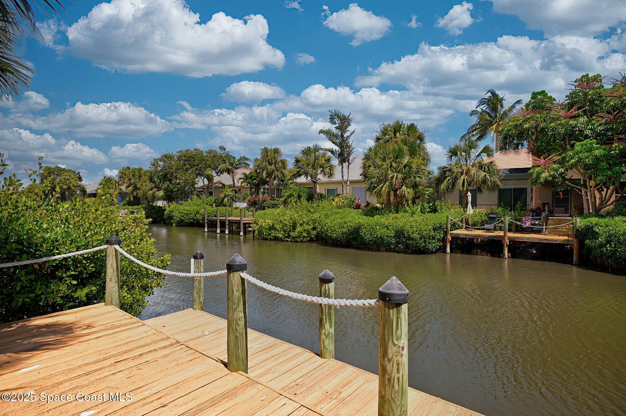 5357 Solway Drive Melbourne Beach, FL 32951 - Photo 21 of 31 a view of a lake with deck