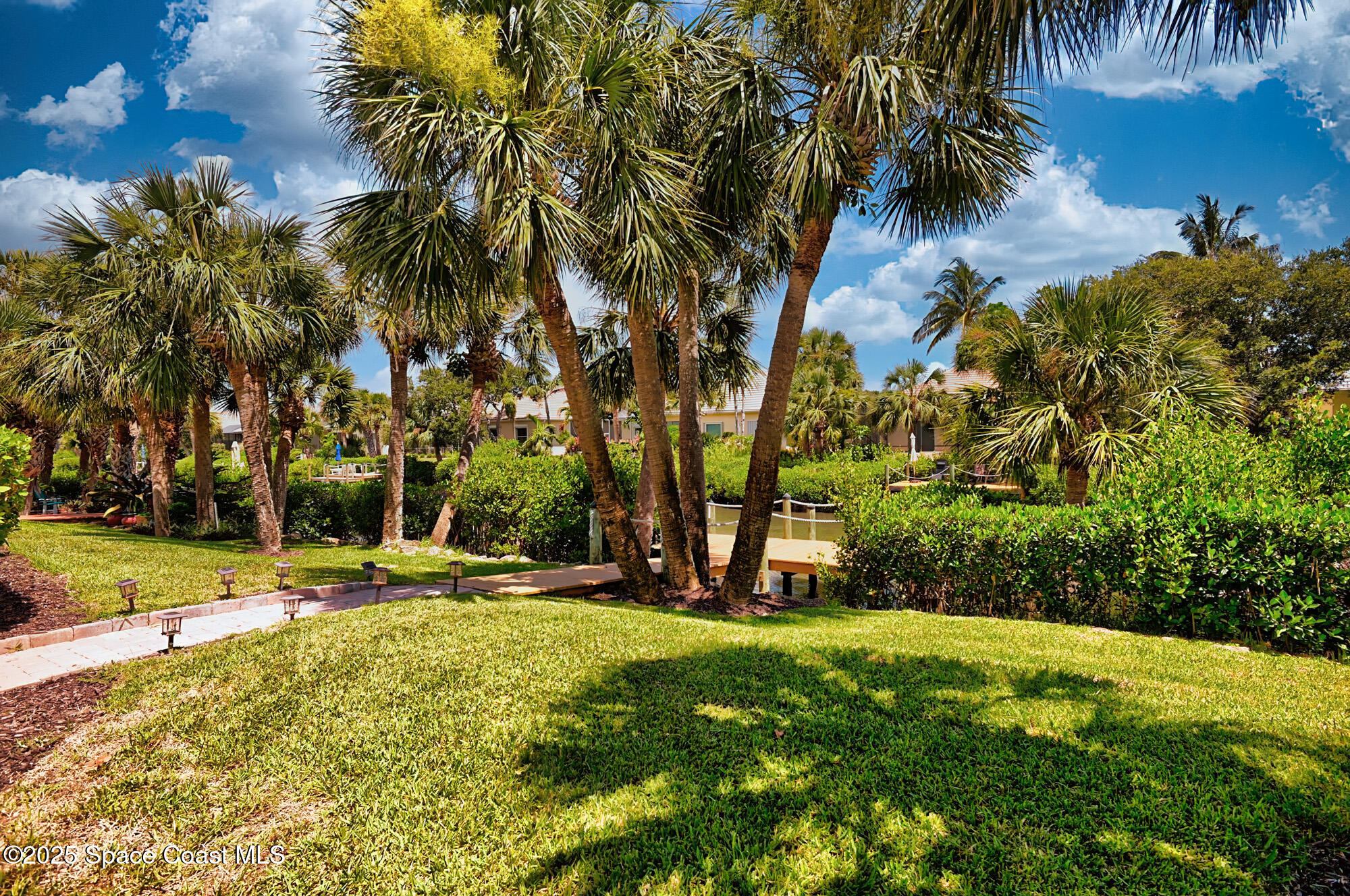 5357 Solway Drive Melbourne Beach, FL 32951 - Photo 22 of 31 a view of outdoor space with garden