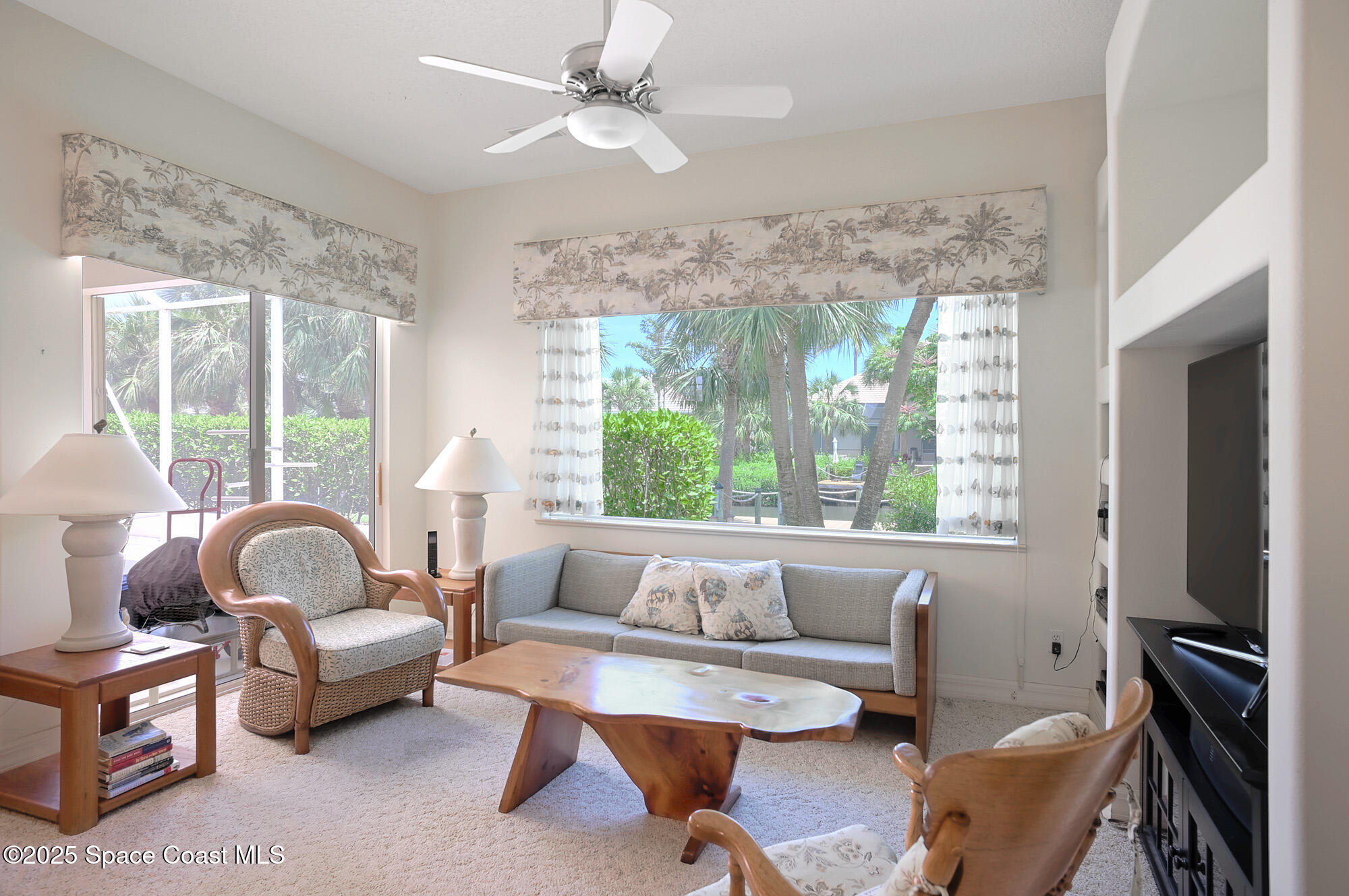 5357 Solway Drive Melbourne Beach, FL 32951 - Photo 7 of 31 a living room with furniture and a large window