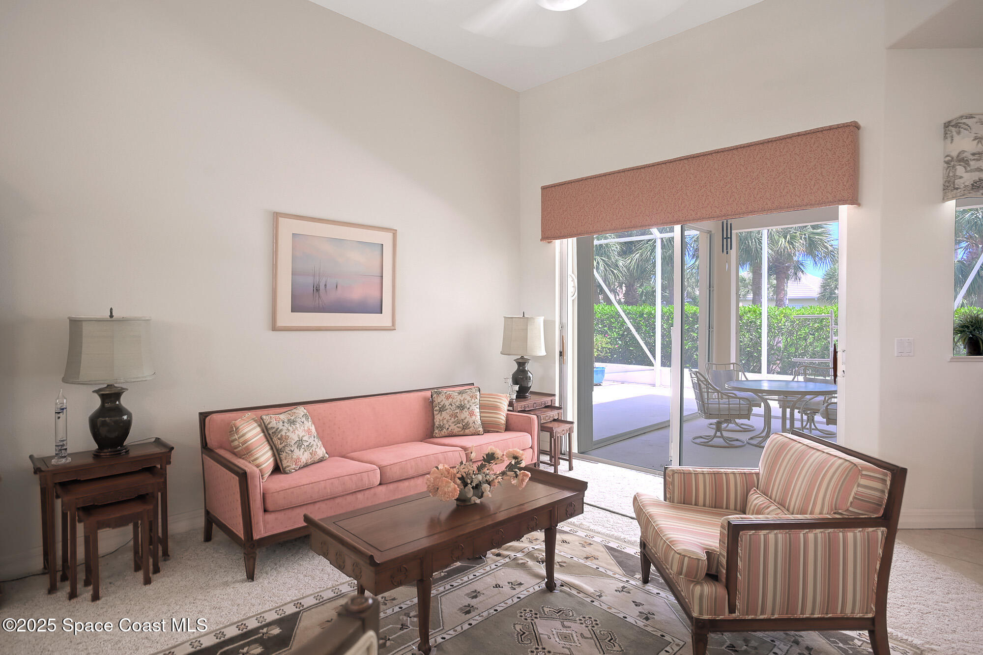 5357 Solway Drive Melbourne Beach, FL 32951 - Photo 8 of 31 a living room with furniture and a large window
