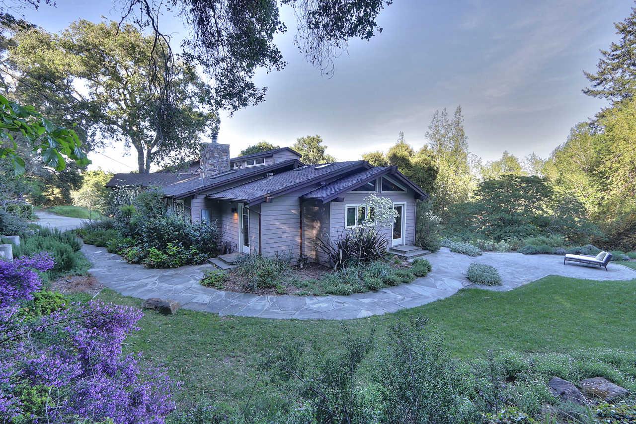 33 Montecito Road Woodside, CA 94062 - Photo 13 of 70 a view of a house with a small yard and a large tree