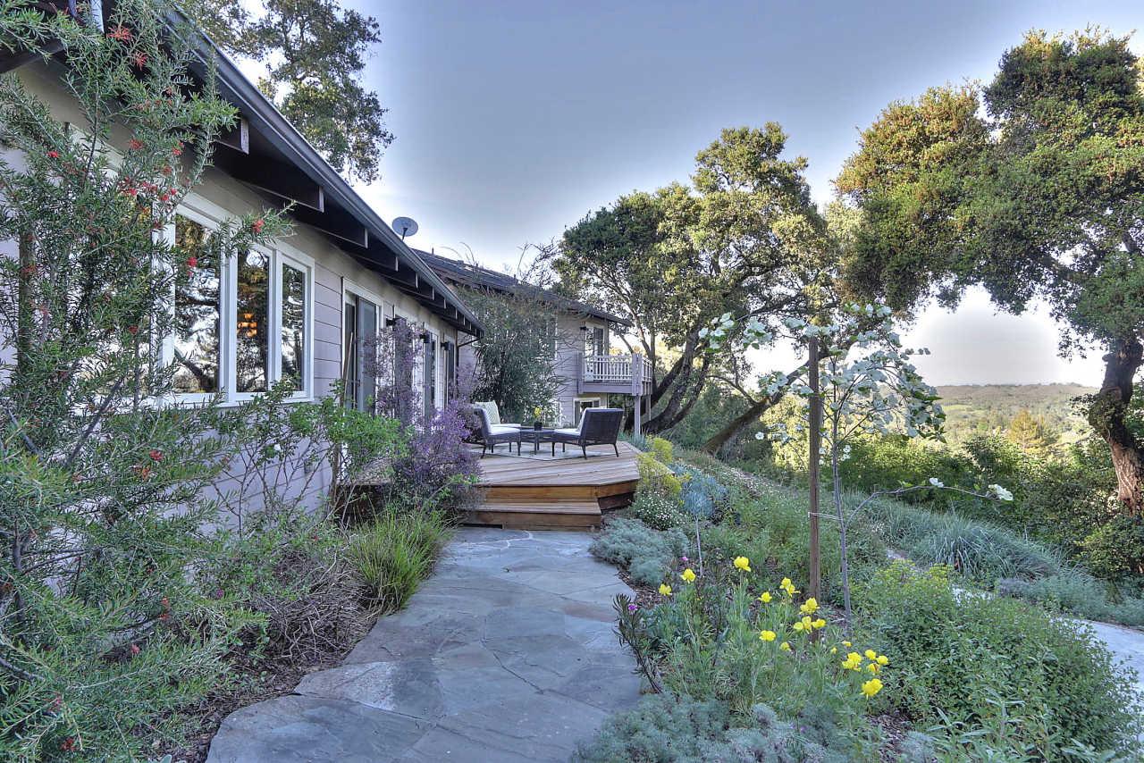 33 Montecito Road Woodside, CA 94062 - Photo 16 of 70 a front view of a house with garden